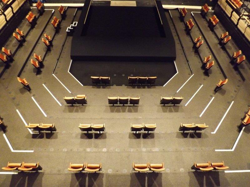 Picture of the Bridge Theatre auditorium with seats removed for social distancing – angle 2
